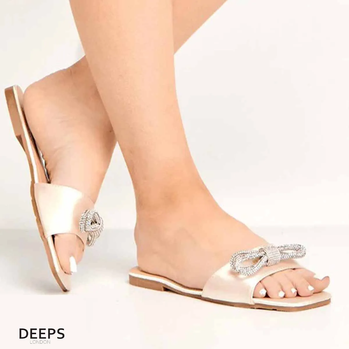 EMANI - WOMEN'S SATIN FLAT FORM SLIDERS WITH DIAMANTE BOW BLACK