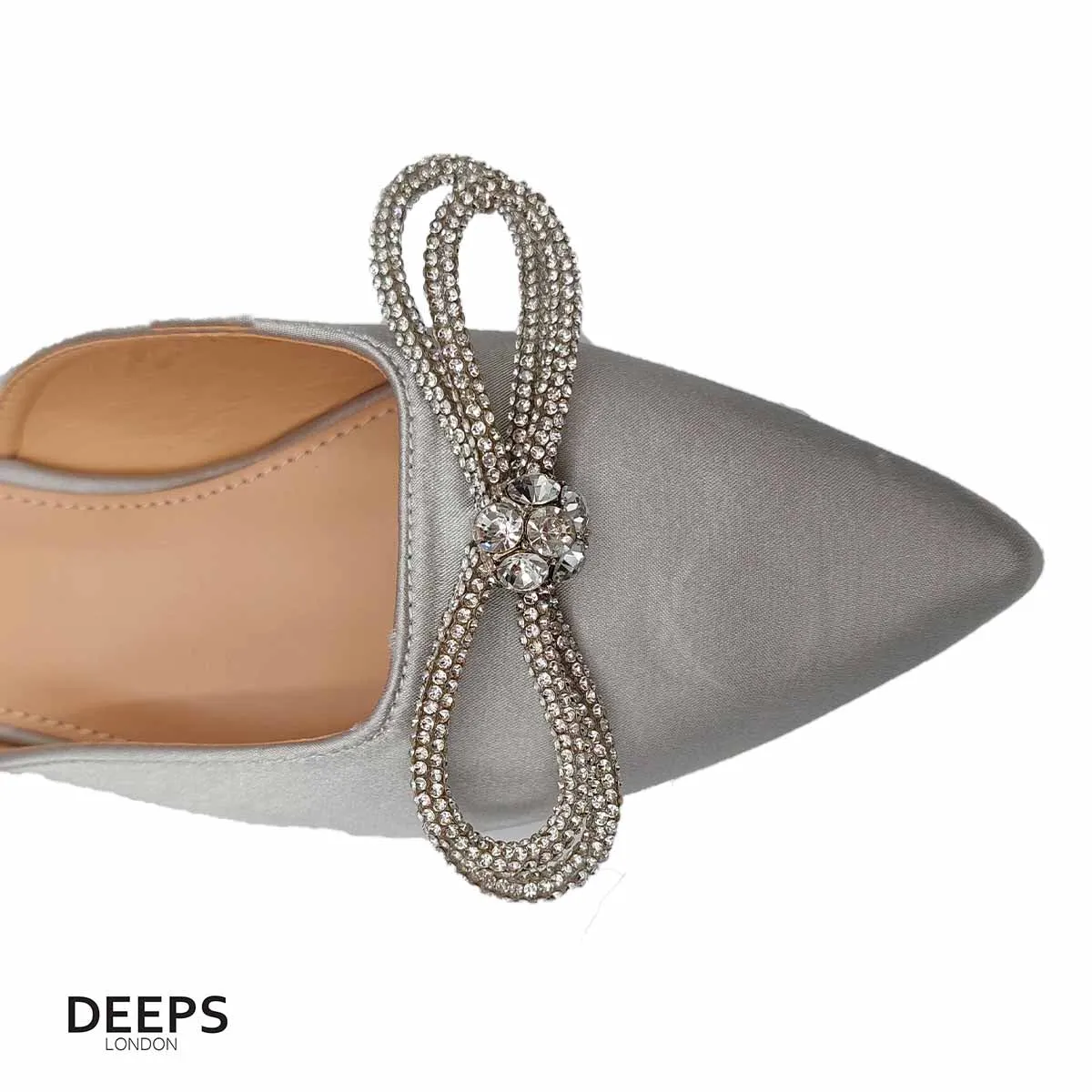 SIKA SATIN FLAT MULE WITH DIAMANTE BOW DETAIL AND WRAP AROUND STRAP FLAT SANDALS